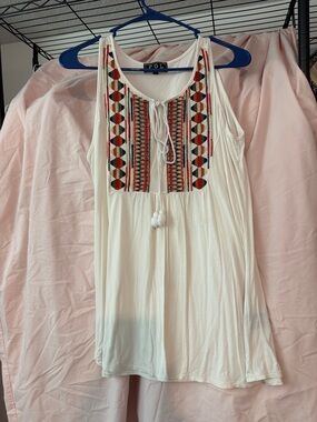 Sleeveless top by POL size small.